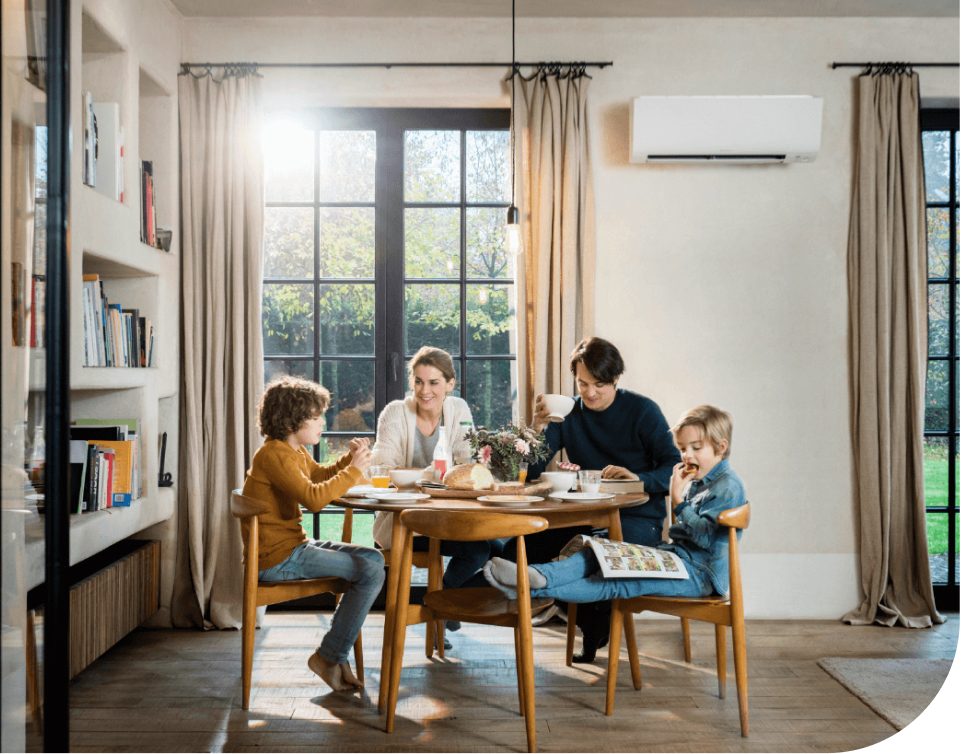 Family enjoying a comfortable home with a Teknicool split system air conditioner