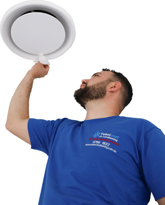 Professional repairman installing an air conditioner